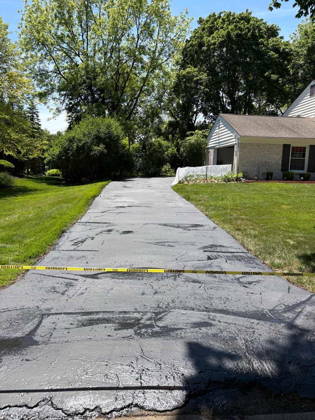 Freshly sealcoated residential driveway